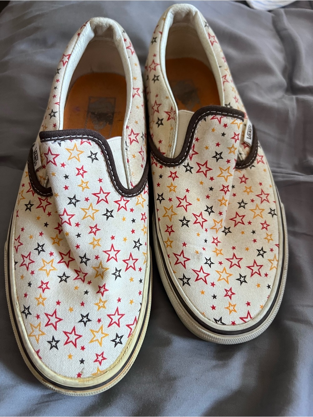 Vintage Vans Slip-On Sneakers with Red, Yellow & Black Star Print 2006-2007